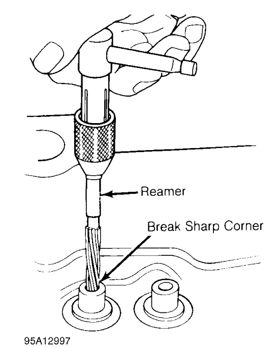 Fig. 7: Reaming Valve Guides