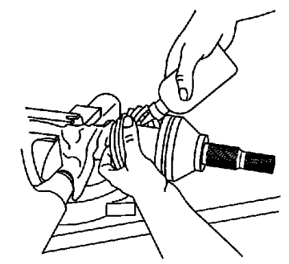 Fig. 59: Inserting Remaining Grease From Service Kit Into Seal