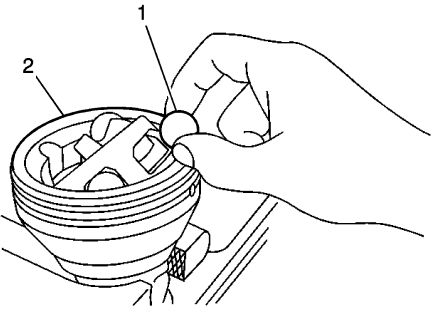 Fig. 65: Removing/Install Ball From Cage & Inner Race