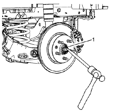 Fig. 30: Removing Stake From Rear Wheel Drive Shaft
